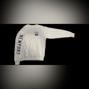 Small new port beach crewneck with writting on the sleeve, plain back